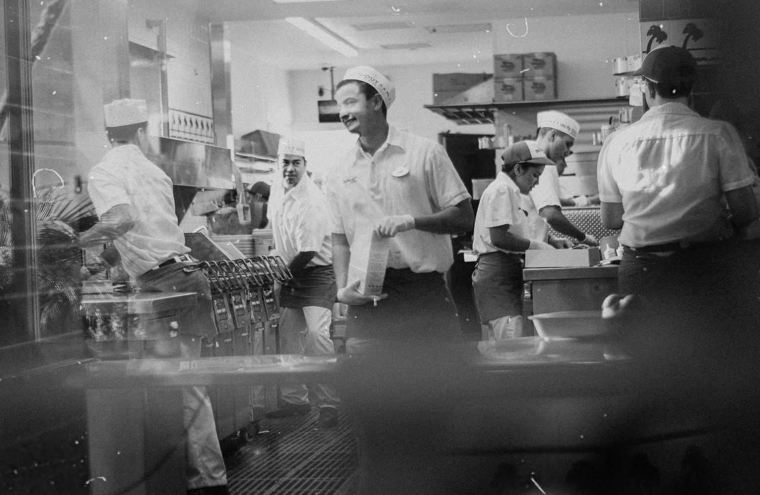 Happy chefs in a well running restaurant kitchen